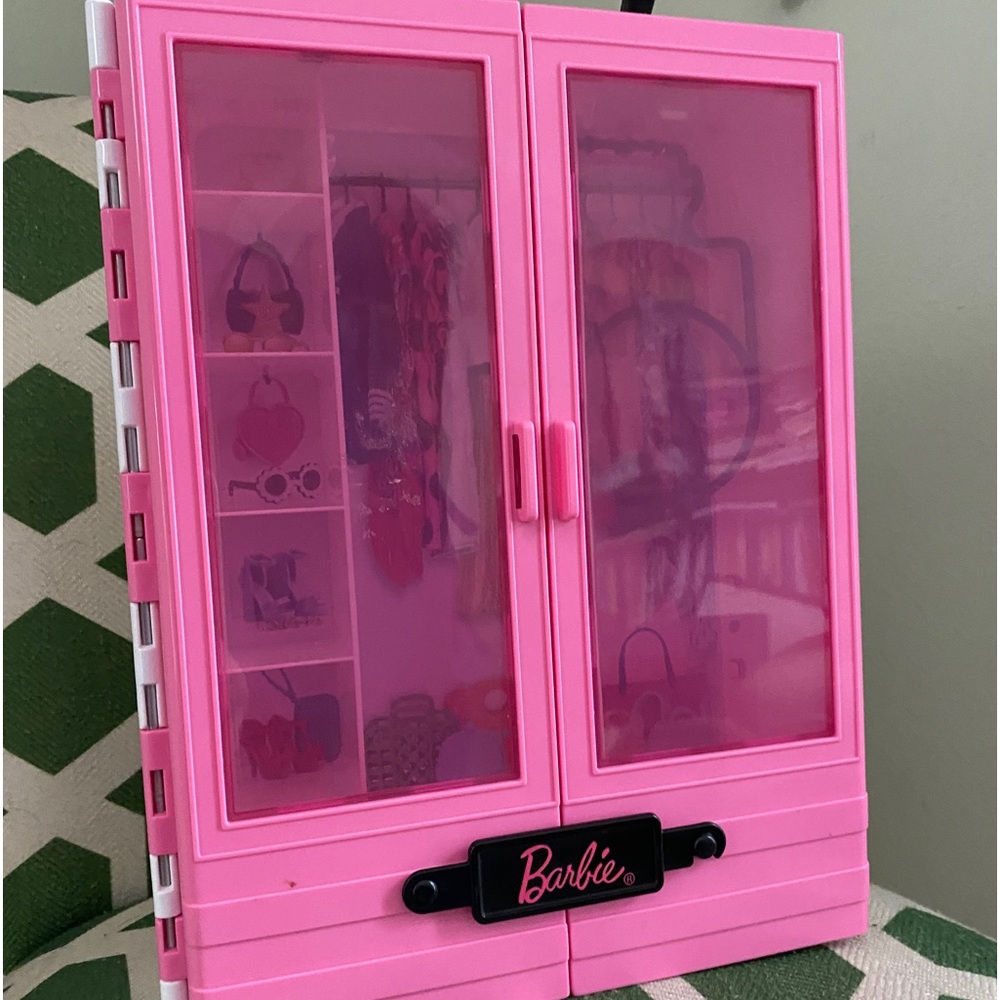 Barbie wardrobe case. Plastic. Folds, portable.
